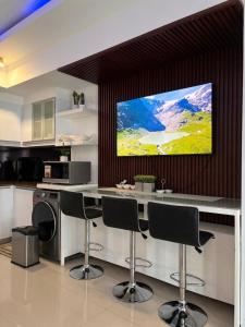 Una cocina o cocineta en Cozy Condo in Venice Luxury Residences Taguig