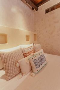 Ένα ή περισσότερα κρεβάτια σε δωμάτιο στο Casona Tunan