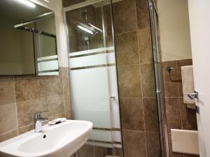 a bathroom with a sink and a shower at Verona Center in Verona