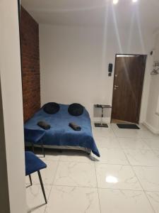 Ένα ή περισσότερα κρεβάτια σε δωμάτιο στο Apartament Starówka 1473 PARKING FREE zależy od dostępności