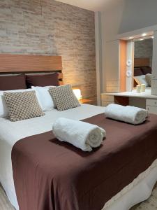 Ένα ή περισσότερα κρεβάτια σε δωμάτιο στο Lysa Paraná