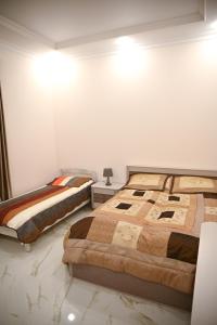 Postel nebo postele na pokoji v ubytování Mer Tun