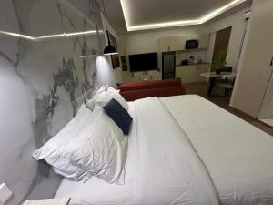 Ліжко або ліжка в номері Bark Luxury Appartments au Plateau Abidjan