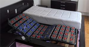 a bed with legos on it in a room at Gîte Charlot - Proche Futuroscope Aquascope in Migné-Auxances +21 photos