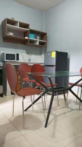 Η κουζίνα ή μικρή κουζίνα στο Departamento Comuna San José