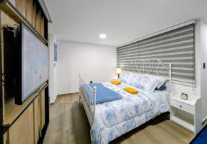 Giường trong phòng chung tại Lienzo Suite