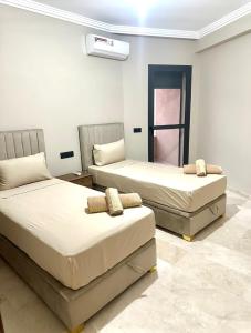 Ảnh trong thư viện ảnh của Garden View- Gueliz-Majorelle appartement 2 chambres- Wifi et piscines ở Oulad Akkou