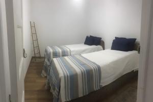 Giường trong phòng chung tại Charming House Secret Rose