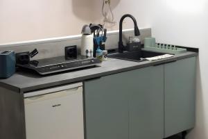 Η κουζίνα ή μικρή κουζίνα στο Charming House Secret Rose