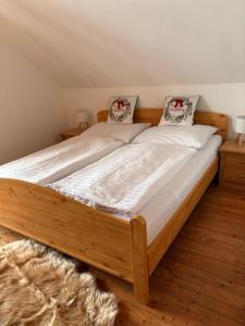 Ένα ή περισσότερα κρεβάτια σε δωμάτιο στο Hirzhof SO Bike&Ski Ridehaus Ski In Ski Out