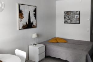 Postel nebo postele na pokoji v ubytování Mukavaa lomailua