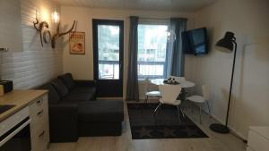 Posezení v ubytování Mukavaa lomailua