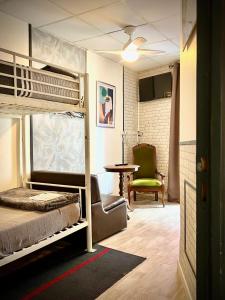 Postel nebo postele na pokoji v ubytování Hôtel Paul Riquet