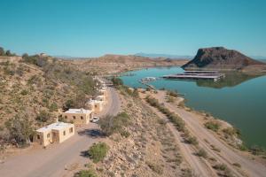 an aerial view of a river and a dock at Dam Site Lodging in Truth or Consequences