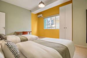 Afbeelding uit fotogalerij van Muse 2-BR Apartment & Balcony in Mar Mikhael in Al Mudawwar