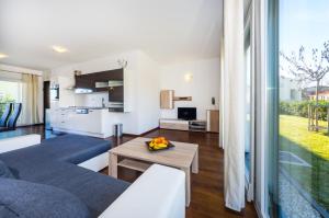 Kuchyň nebo kuchyňský kout v ubytování Queen Beach Apartments