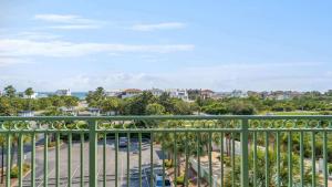 a balcony with a view of a parking lot at Inn at Seacrest Beach 408 in Rosemary Beach