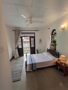 Postel nebo postele na pokoji v ubytování Airport Gateway Residence