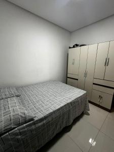 Ένα ή περισσότερα κρεβάτια σε δωμάτιο στο HOME 111 - Casa completa em Petrolina