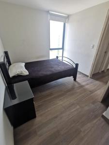 Ένα ή περισσότερα κρεβάτια σε δωμάτιο στο DEPA Cosmopol acepto roomies