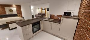 Η κουζίνα ή μικρή κουζίνα στο Gartencharlet