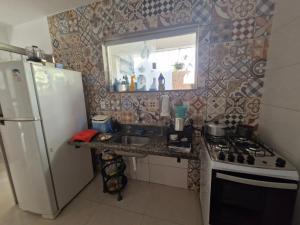 Кухня или мини-кухня в Casa Completa Sossego Wifi Pet Criança
