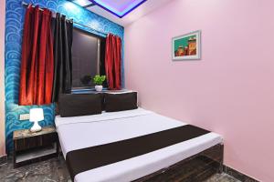 Ένα ή περισσότερα κρεβάτια σε δωμάτιο στο Hotel O Sigma