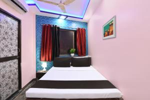 Ένα ή περισσότερα κρεβάτια σε δωμάτιο στο Hotel O Sigma