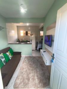 Η κουζίνα ή μικρή κουζίνα στο Recanto do Coral