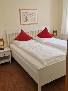 Ένα ή περισσότερα κρεβάτια σε δωμάτιο στο Haus am Mühlenweg - neue, moderne und sonnendurchflutete Appartements