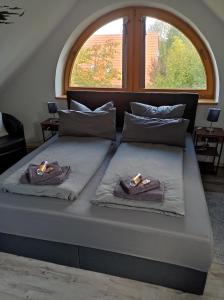 Ένα ή περισσότερα κρεβάτια σε δωμάτιο στο Gästezimmer Öcken