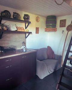 Η κουζίνα ή μικρή κουζίνα στο Menyecske Vendégház +3 φωτογραφίες