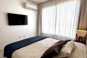 Postel nebo postele na pokoji v ubytování Auguri House 3 bedrooms, large living room with garden