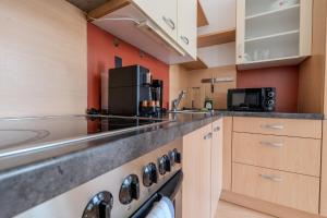Η κουζίνα ή μικρή κουζίνα στο Apartments Leoben