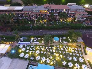 an aerial view of a hotel courtyard at night at Hotel Caparena in Taormina