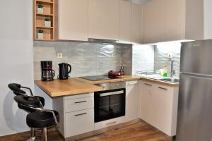 Ảnh trong thư viện ảnh của A modern apartment in the village of Venerato ở Veneráton