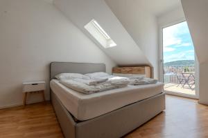 Ένα ή περισσότερα κρεβάτια σε δωμάτιο στο Apartments Leoben