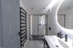 Ванная комната в Apartmán Pradědův +24 фотографии