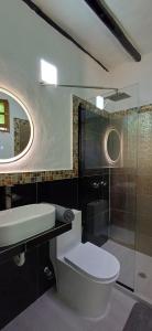 Et badeværelse på Chilli's Posada