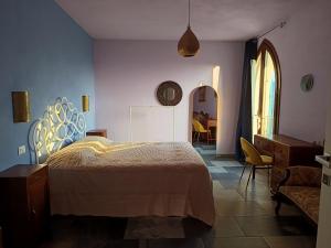 Ένα ή περισσότερα κρεβάτια σε δωμάτιο στο That's amore casa vacanze B&B