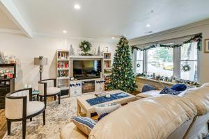 a living room with a christmas tree and a couch at 2 Mi to Beach Holiday Home in North Cape May in North Cape May