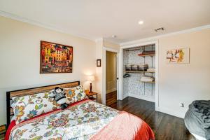 a bedroom with a bed with a teddy bear on it at 2 Mi to Beach Holiday Home in North Cape May in North Cape May