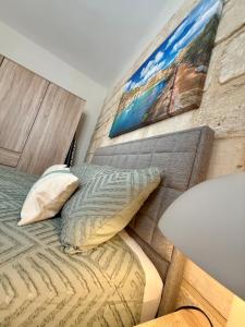 Ένα ή περισσότερα κρεβάτια σε δωμάτιο στο AS3 - The Alley Suites Apartment in Gudja