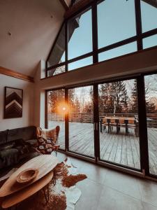 Χώρος καθιστικού στο Black Cabin Pohorje - Luxury Retreat