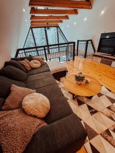 Χώρος καθιστικού στο Black Cabin Pohorje - Luxury Retreat