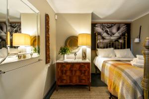 Ένα ή περισσότερα κρεβάτια σε δωμάτιο στο The smallest farm in Africa ELGIN +25 φωτογραφίες