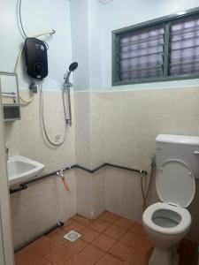 Koupelna v ubytování Leaf Haven Homestay + 8 fotografií