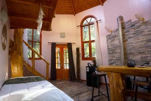 Postel nebo postele na pokoji v ubytování Andesenios Los Esenios de los Andes + 72 fotografií