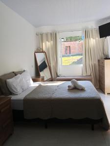 Ένα ή περισσότερα κρεβάτια σε δωμάτιο στο Casa de Campo Sol & Luz +29 φωτογραφίες