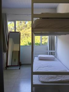 Ένα ή περισσότερα κρεβάτια σε δωμάτιο στο Casa de Campo Sol & Luz